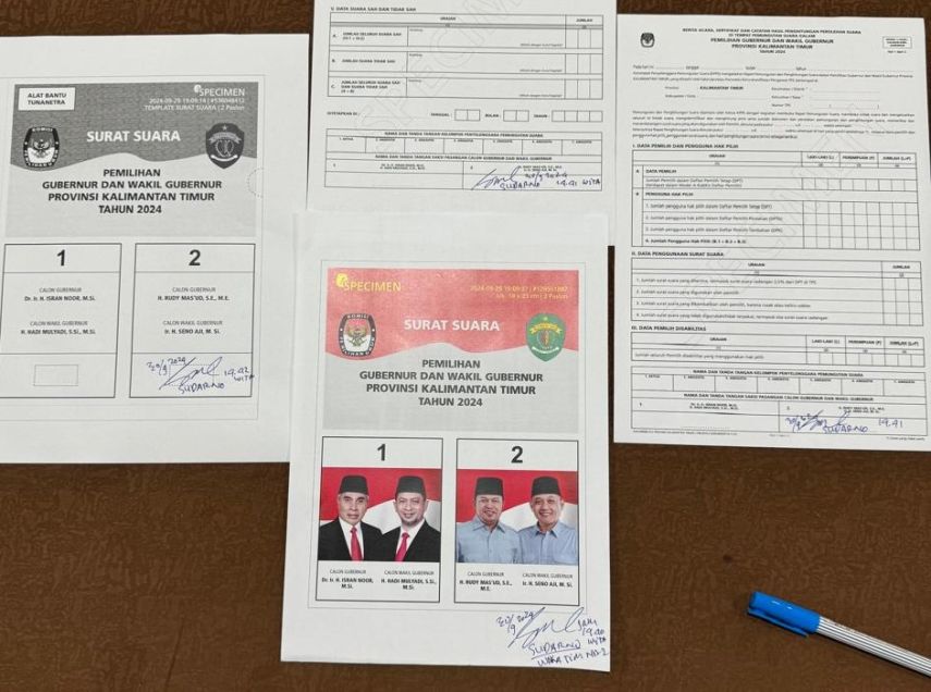 uploads/2024/10/spesimen-surat-suara-yang-disetuju-masing-masing-tim-lo-dari-kedua-pasangan-calon-gubernur-dan-wakil-gubernur-kaltim-di-pilkada-2024-66fc2e611a658.jpeg